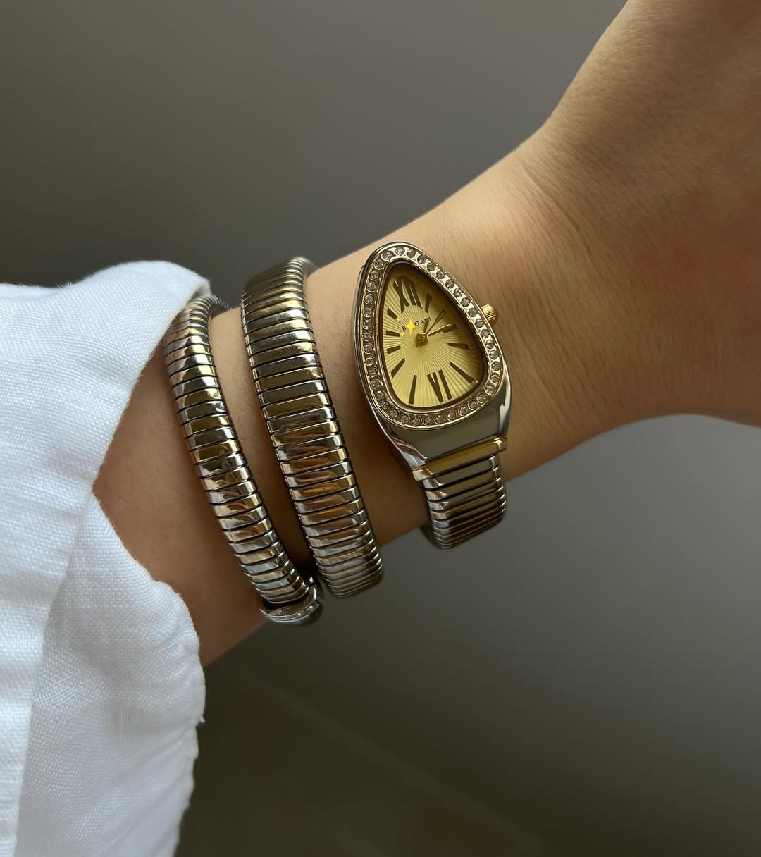BVL TWO TONE GOLD SERPANTINE SPIRAL WATCH